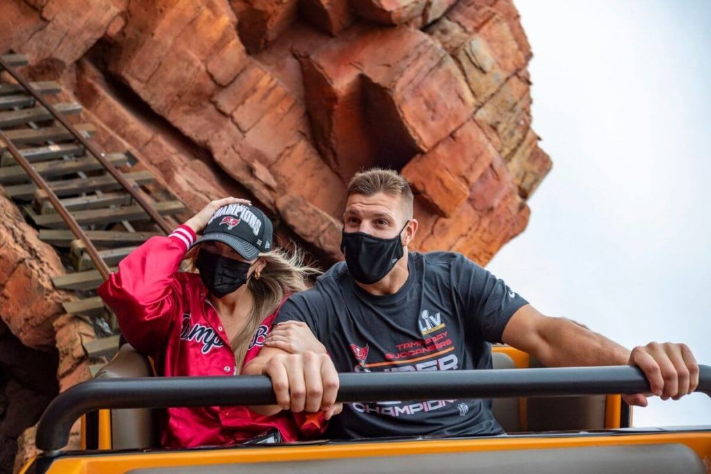 Tampa Bay Bucaneers tight end Rob Gronkowskia nd fiancée Camile Kostek ride Big Thunder Mountain Railroad roller coaster at Disney World's Magic Kingdom.