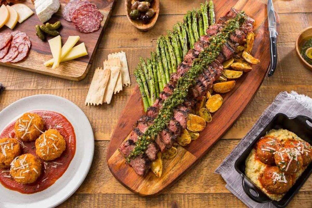 Flat lay photo of various dishes at available at Wine Bar George.