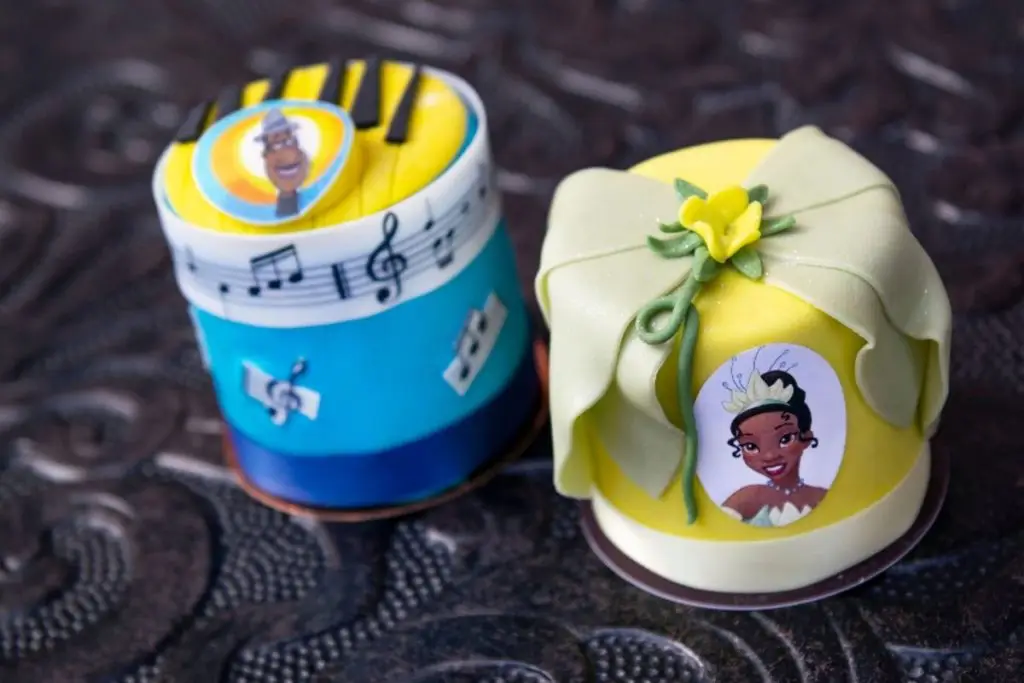 Closeup of 2 miniature cakes, L-R: Pixar's Soul theme and Disney's Princess Tiana theme.