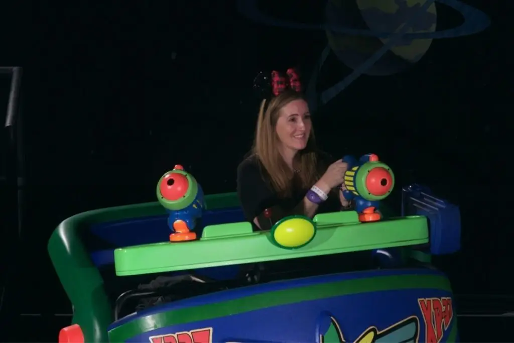 Photo of The Park Pixie riding Buzz Lightyear Space Ranger Spin at Magic Kingdom.