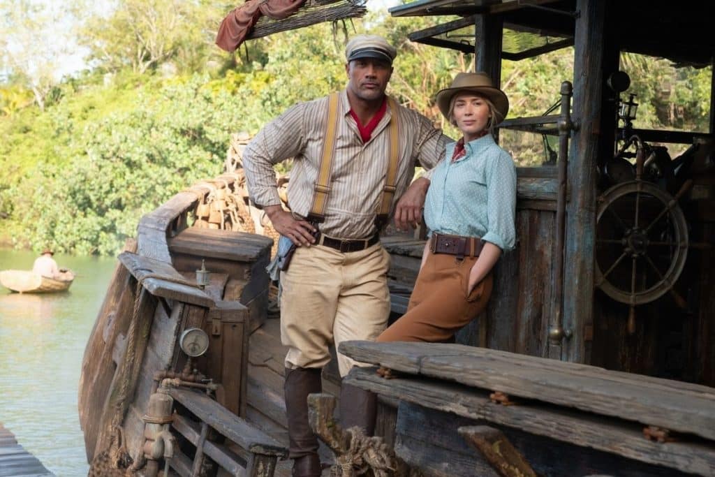 Movie still from Disney's Jungle Cruise, featuring actors Dwayne Johnson and Emily Blunt.