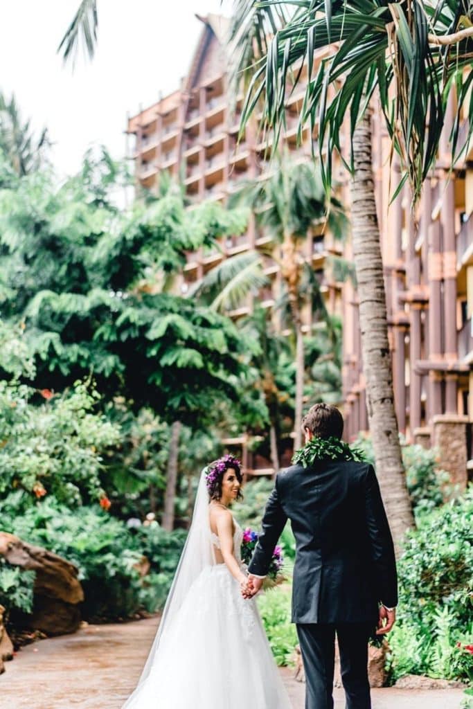 Romantic photo of a bride and groom at Aulani, a Disney Resort.