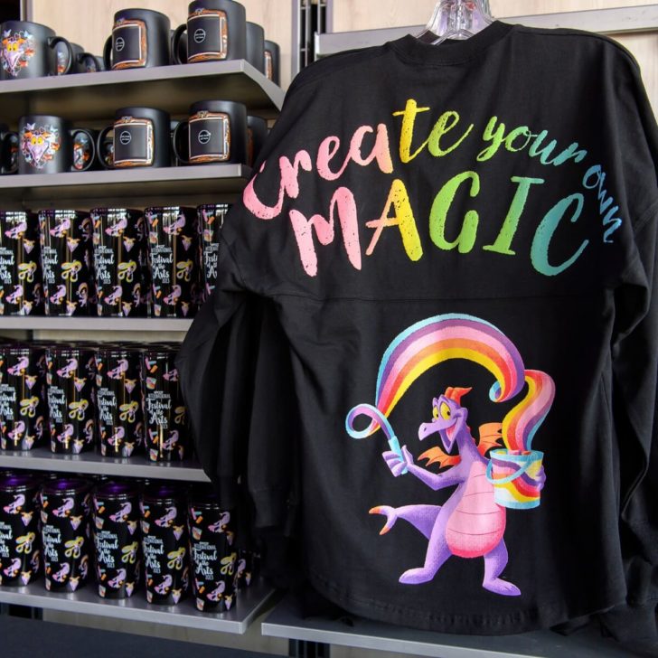 Photo of an Epcot Festival of Arts merchandise display featuring Figment the dragon.