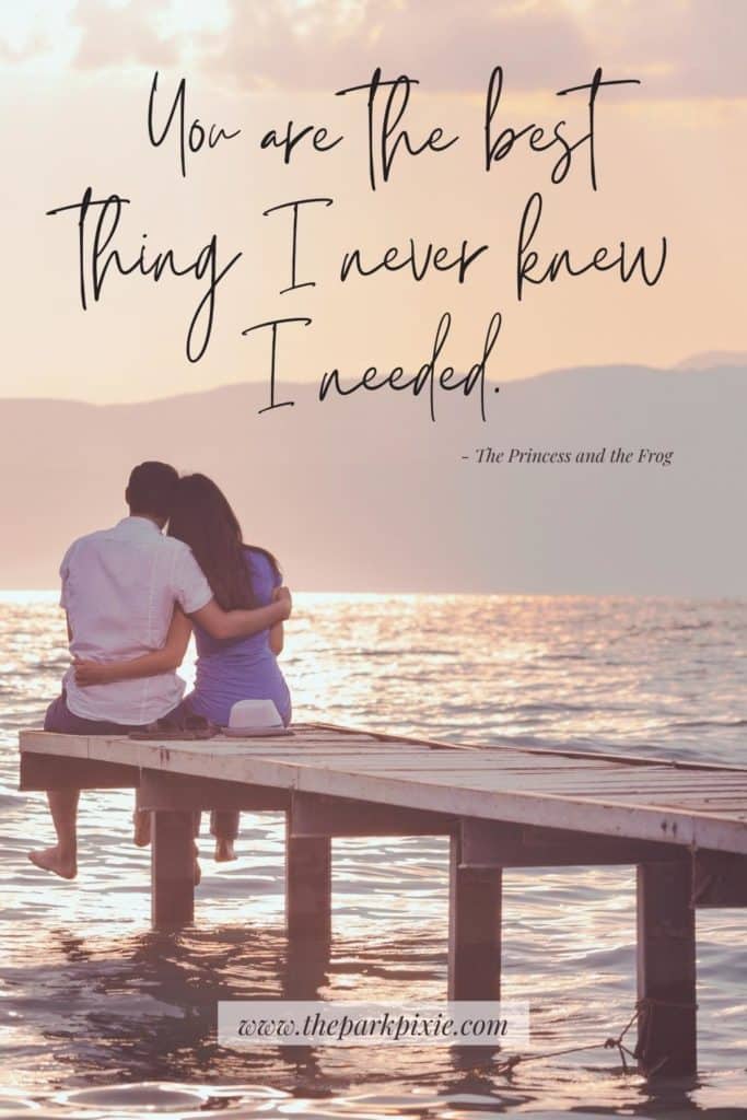 Photo of a couple sitting at the end of a dock. Text above the photo reads "You are the best thing I never knew I needed, " a quote from Disney's The Princess and the Frog.