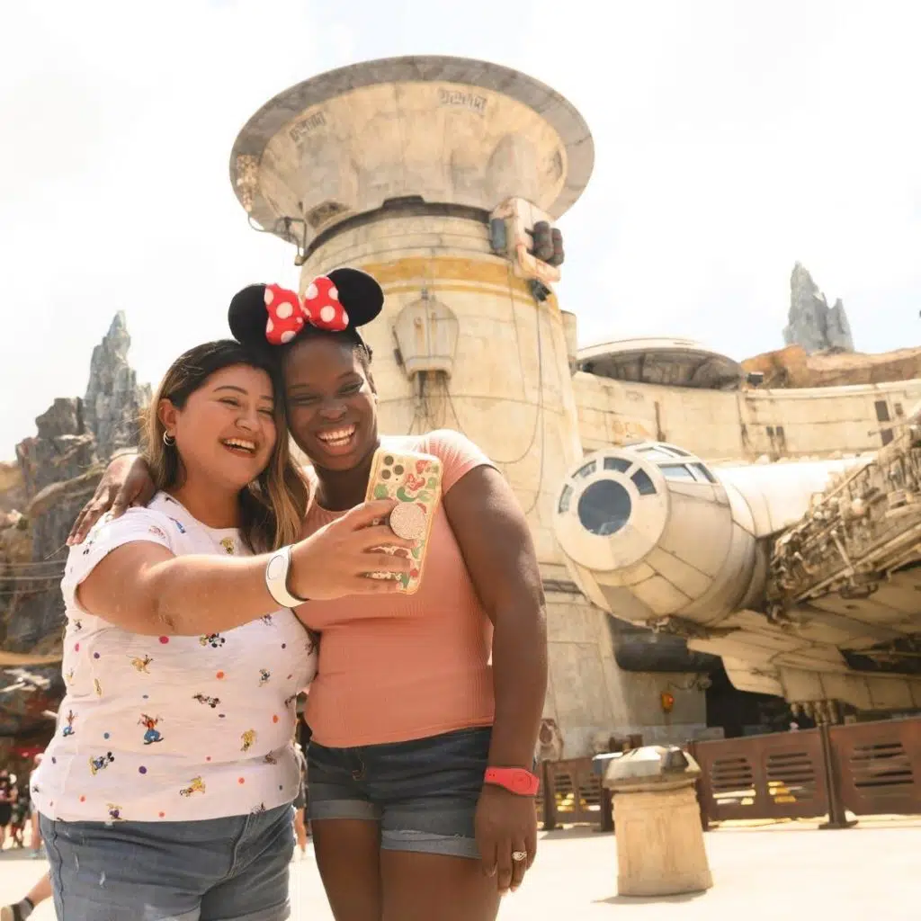 Photo of 2 women taking a selfie at Star Wars Galaxy Edge in Disney World's Hollywood Studios.