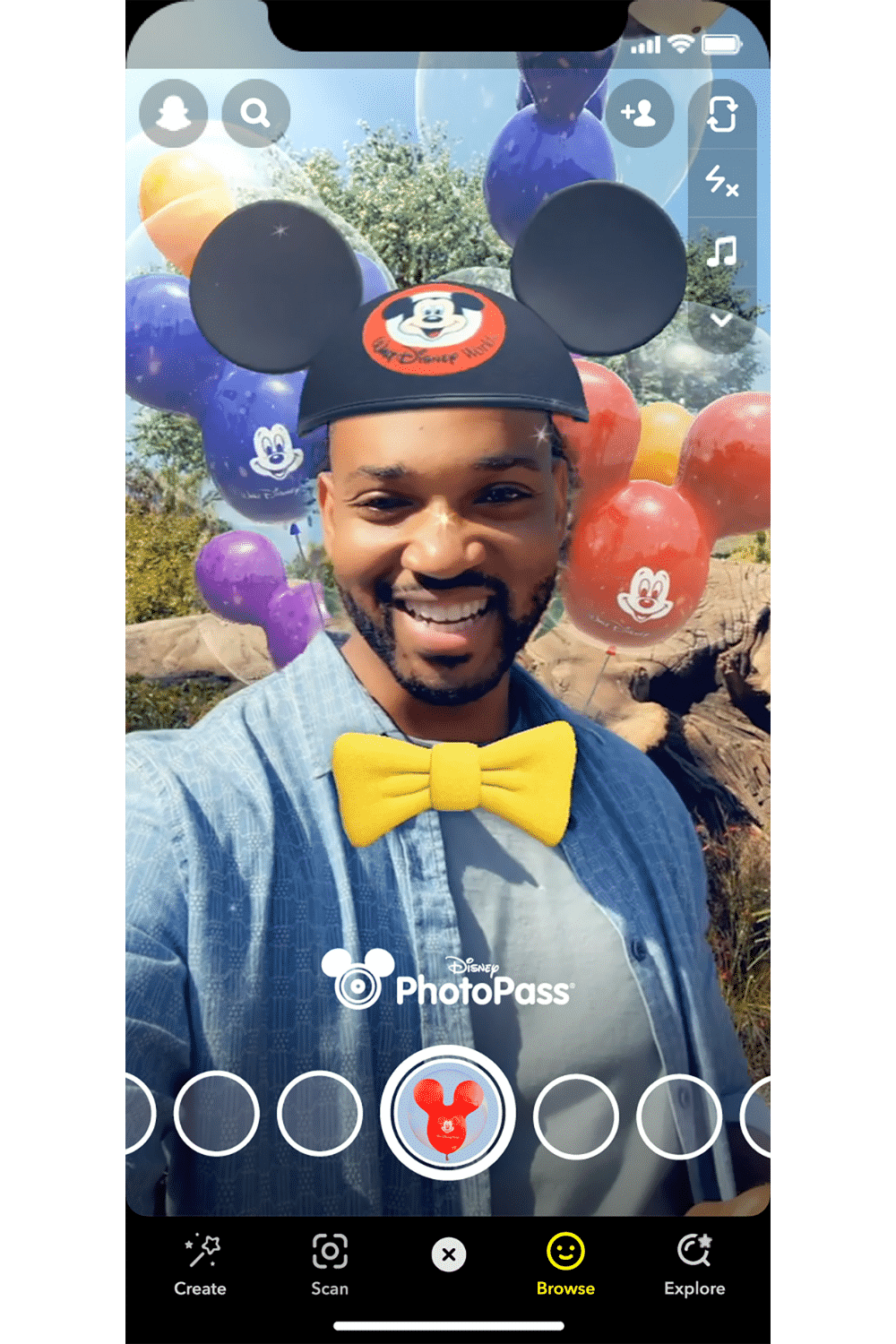 Screenshot of a woman using the Disney x Snap Mickey Hat & Bowtie filter.