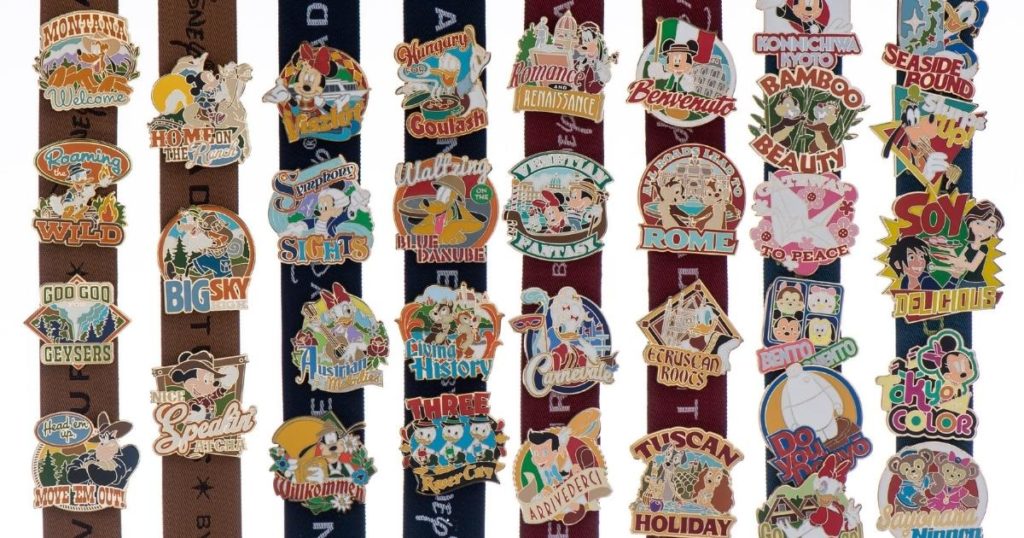 Closeup of a collection of pins from Adventures by Disney.