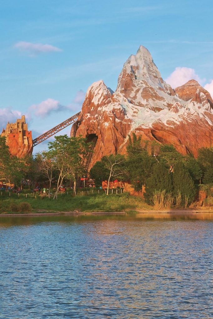Photo of the Expedition Everest roller coaster at Animal Kingdom from across the lake.
