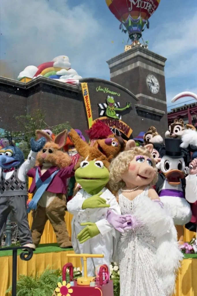 Photo of Muppet characters standing outside the Muppet*Vision 3D show building at Hollywood Studios in Florida.