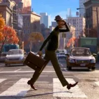 Animated still from Soul with the main character, Joe, walking across the street.