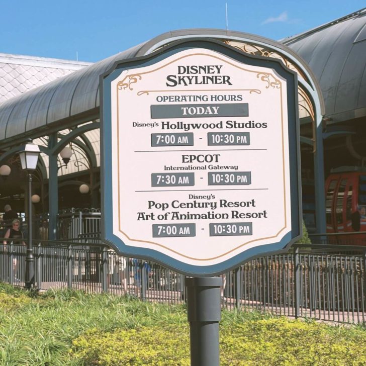 Closeup of a sign with the hours of operation for the Skyliner.
