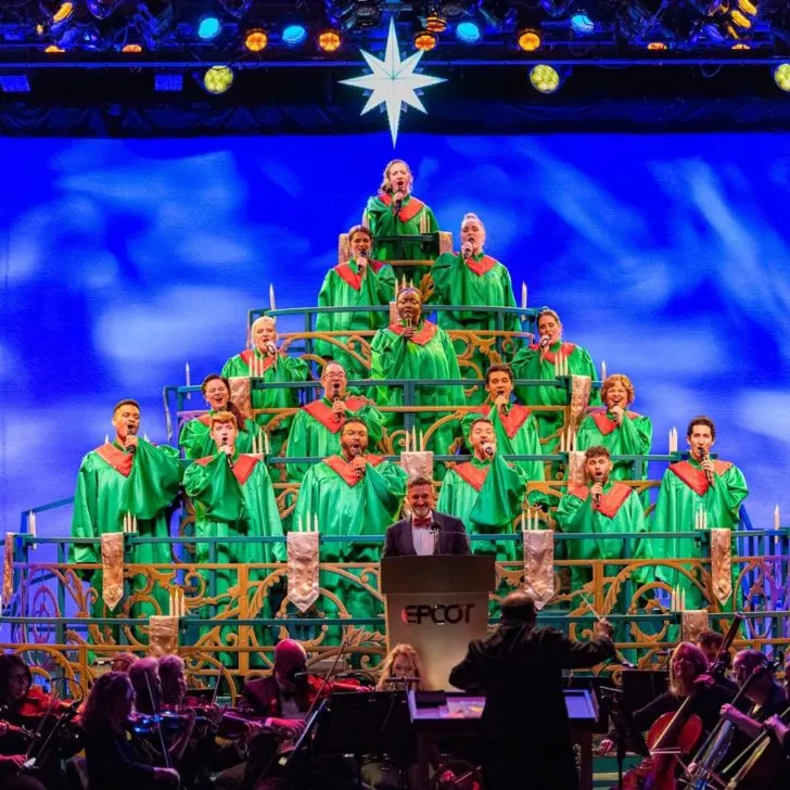 Photo of the choir singing at the Epcot Candlelight Processional show.