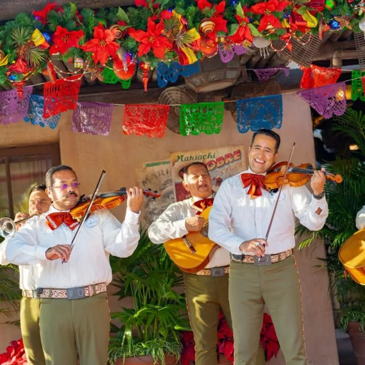 Photo of a mariachi band performing.