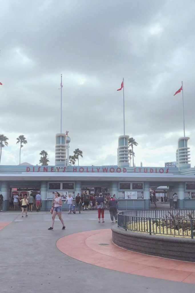 Photo of the main entrance for Disney's Hollywood Studios with cloudy skies.