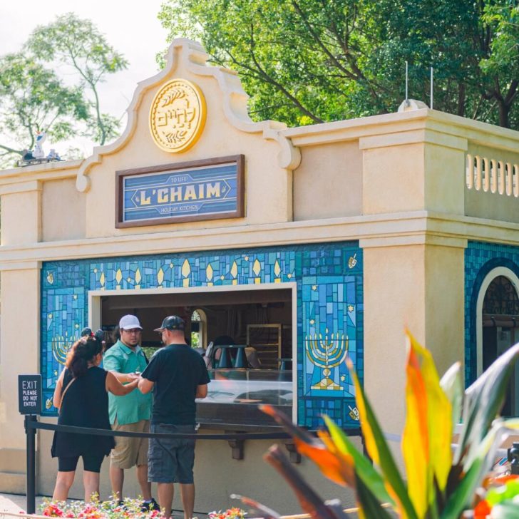 Photo of people lined up outside the L'Chaim Holiday Kitchen at the Epcot Festival of the Holidays.