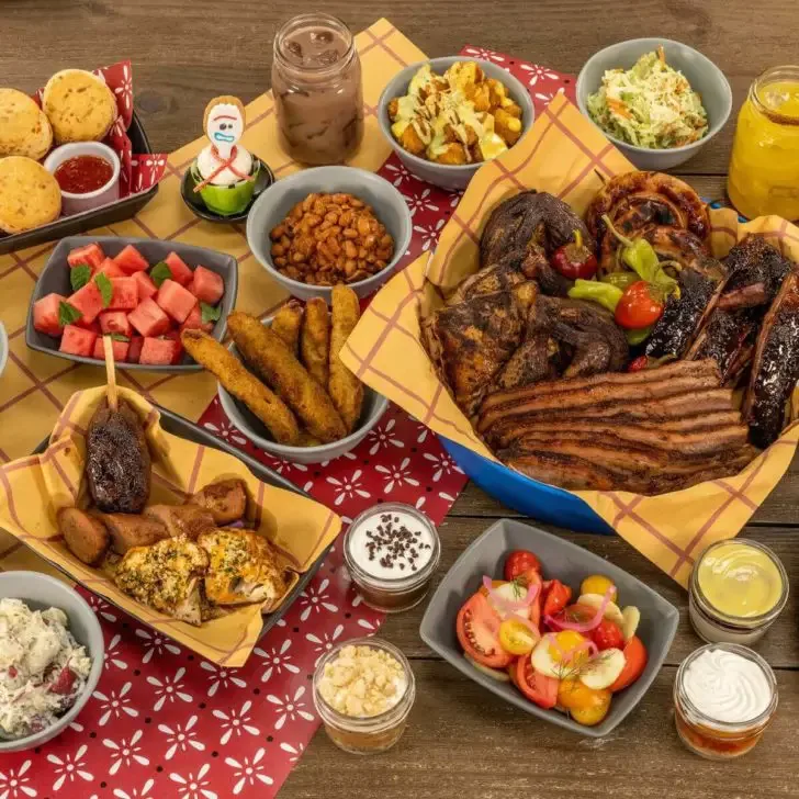 Photo of a food spread of menu items from the new Roundup Rodeo BBQ restaurant at Hollywood Studios' Toy Story Land.