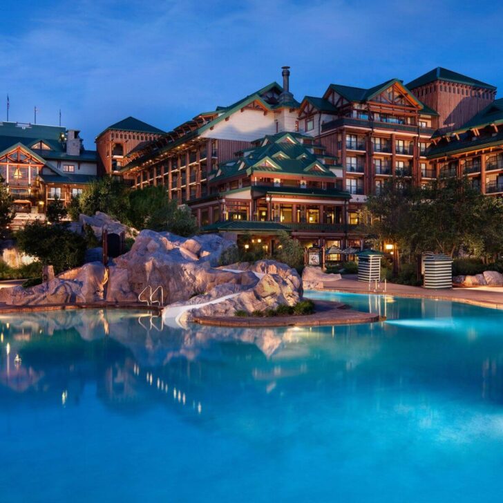 Photo of the feature pool at night at Disney's Wilderness Lodge.