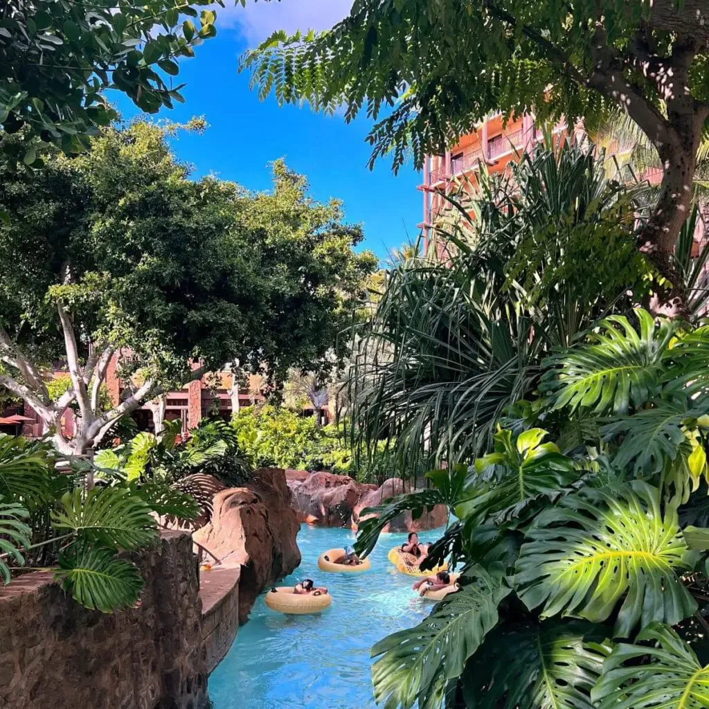 Photo of the Waikolohe Stream lazy river from the top of a bridge at Aulani resort in Hawaii.