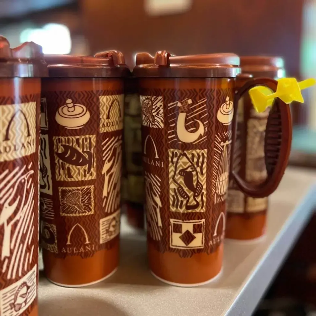 Closeup of a group of refillable mugs at Ulu Cafe.