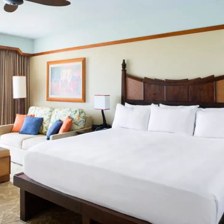 Photo of a standard room with 1 queen bed and a sofa at Aulani Disney Resort.