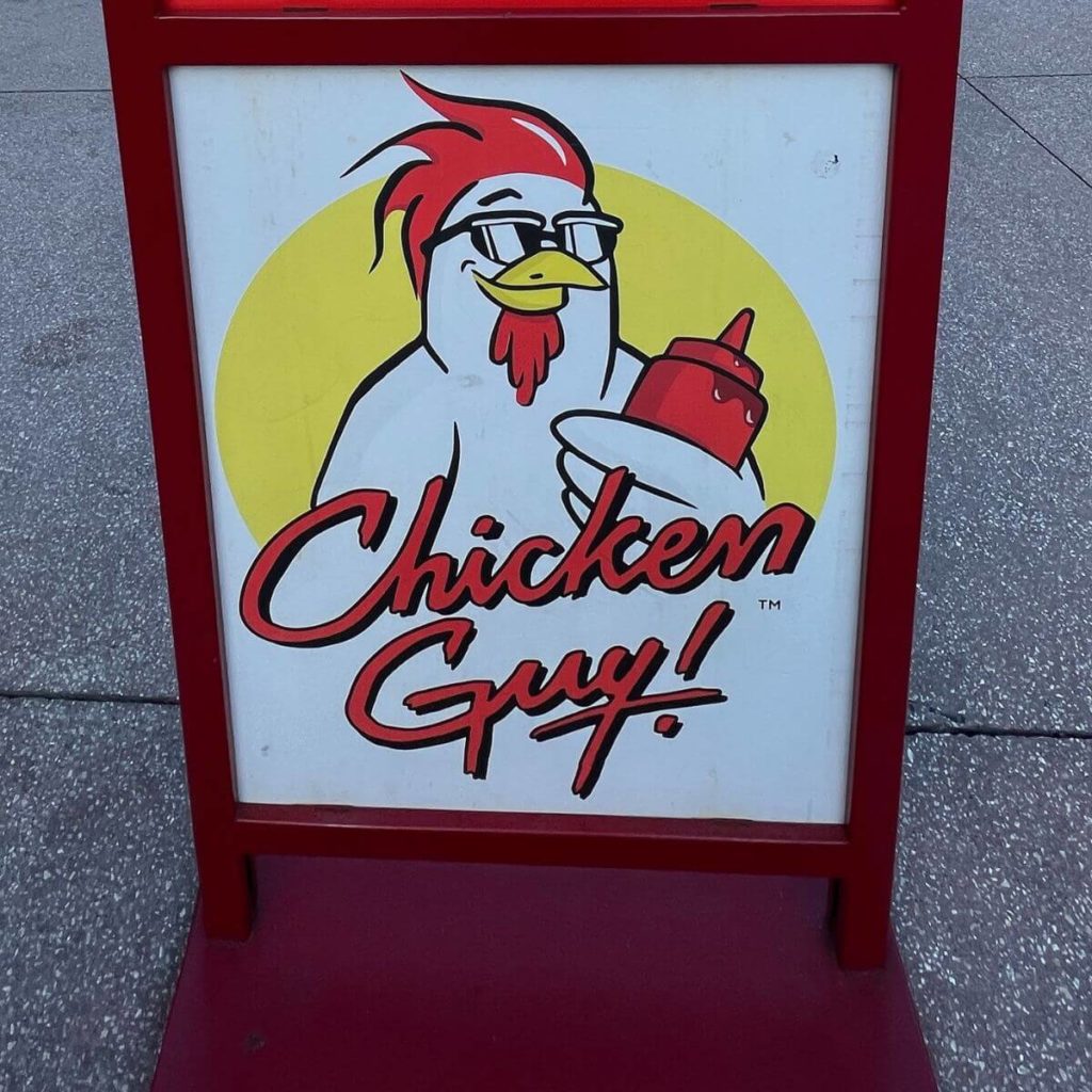Photo of the signage for Guy Fieri's Chicken Guy! at Disney Springs.
