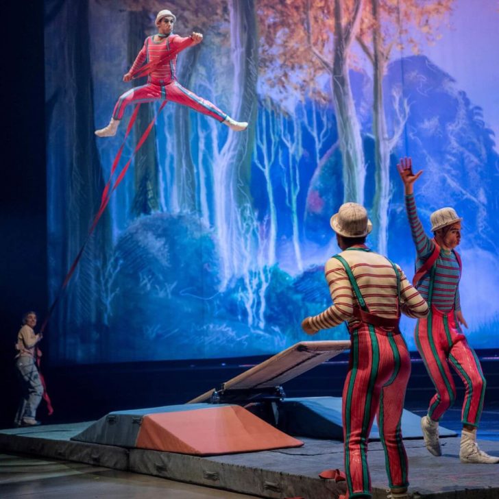 Photo of circus performers rehearsing an acrobatic scene for Disney & Cirque du Soleil's show, Drawn to Life.