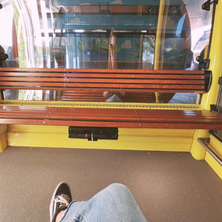 Photo inside a Skyliner cabin, showing one of the wooden benches.
