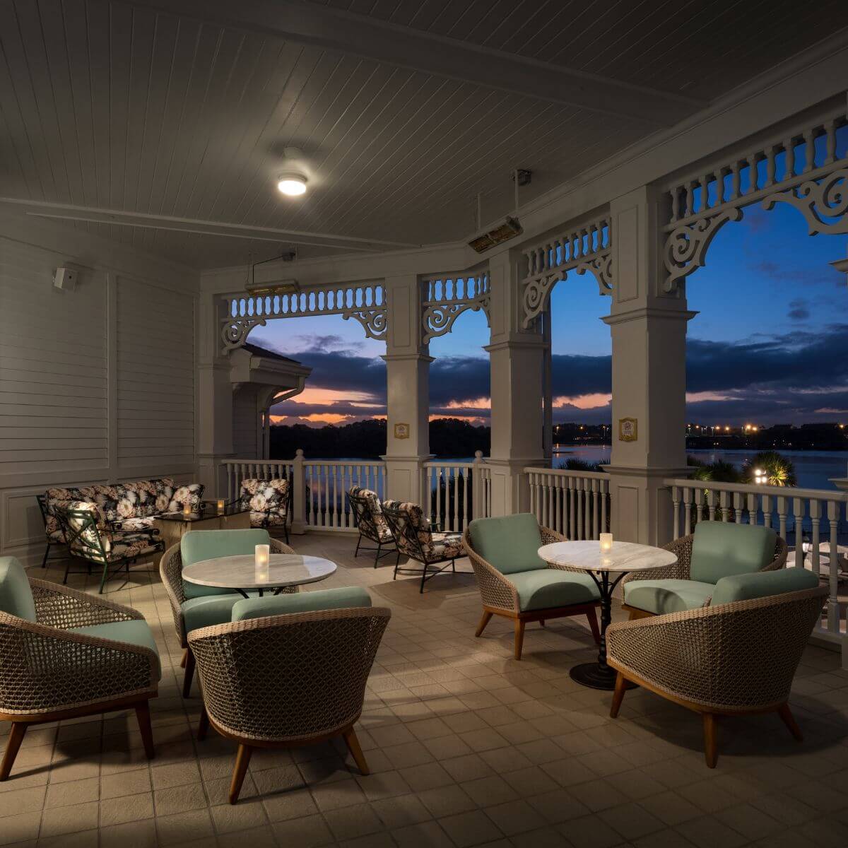 Photo of the Enchanted Rose Lounge balcony during sunset at the Grand Floridian Resort & Spa at Disney World.