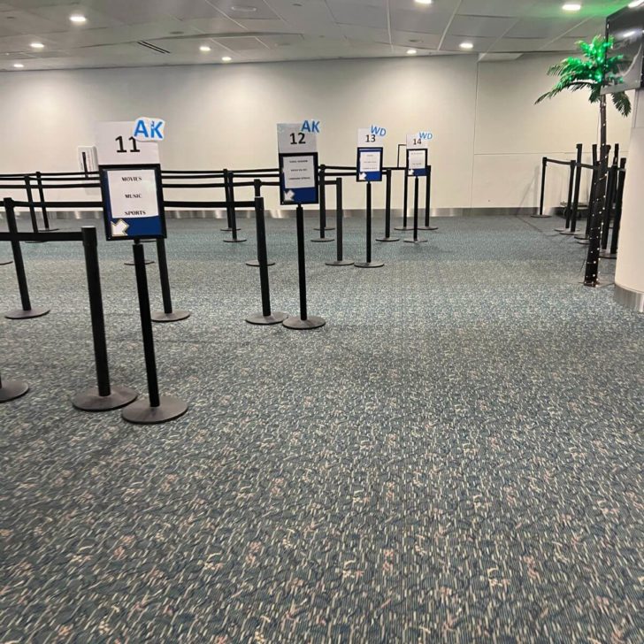 Photo of the waiting area for the Mears Connect Disney World Airport Shuttle at MCO.