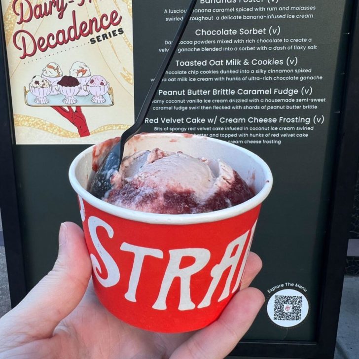 Photo of a cup of strawberry balsamic ice cream from Salt & Straw with the specials menu in the background.