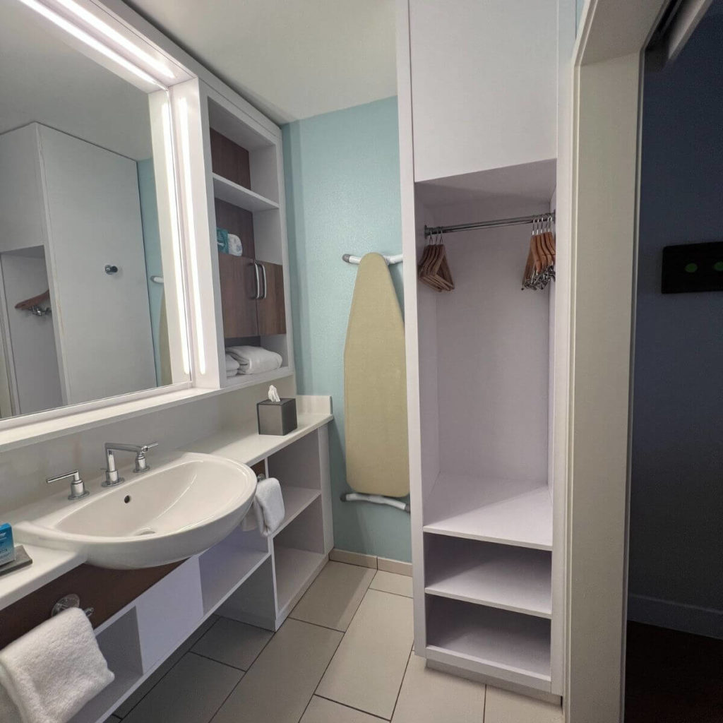 Photo of the renovated sink and closet area in the Pop Century rooms.