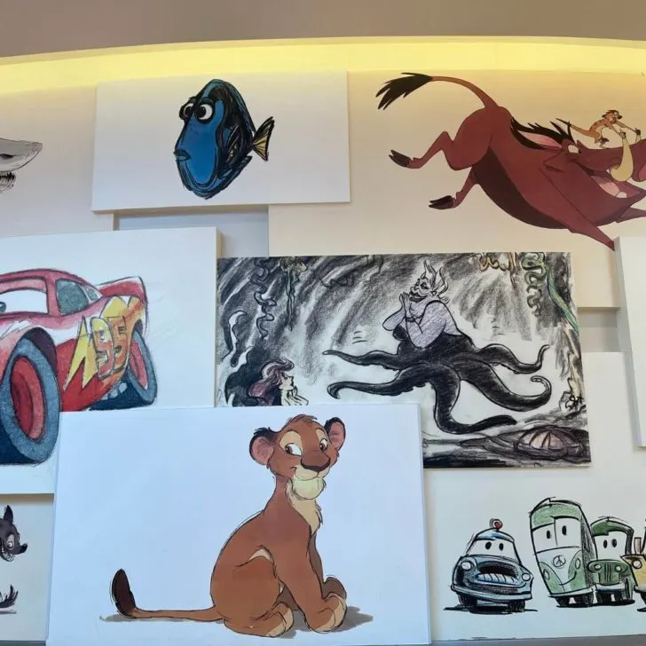 Photo of enlarged animation drawings of Disney and Pixar characters in the lobby of the Art of Animation Resort.
