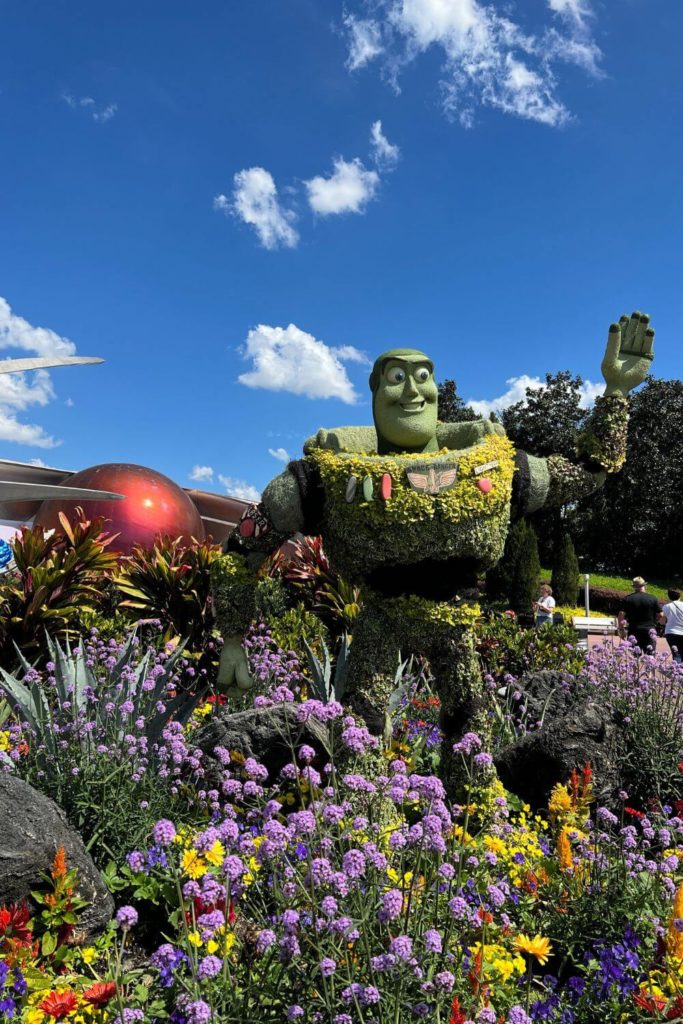Photo of the Buzz Lightyear topiary outside the Mission: Space ride.