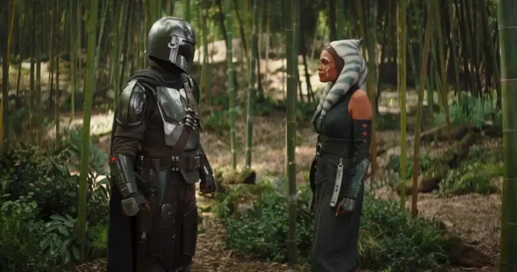 Photo still of a scene between Ahsoka Tano and The Mandalorian when he attempts to visit Grogu.