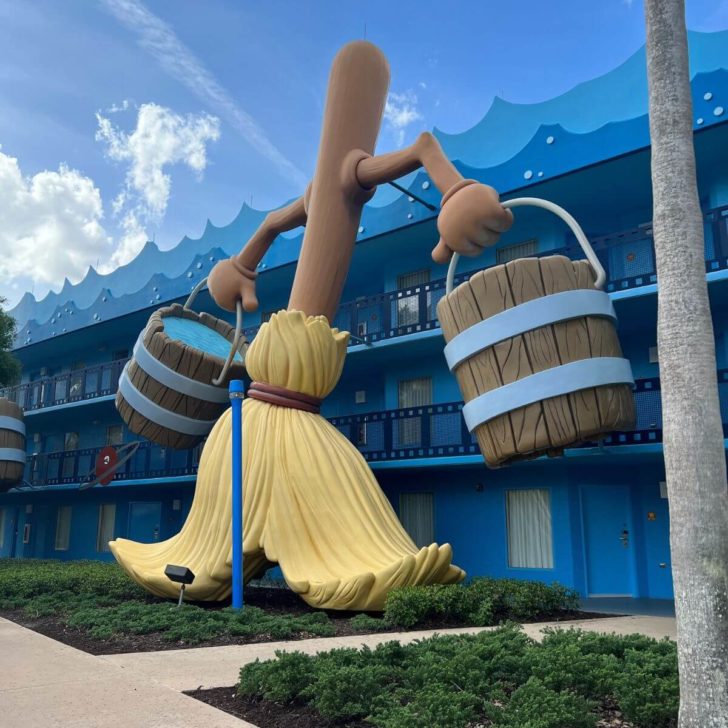 Photo of a massive statue of the walking broomstick with buckets from Fantasia.