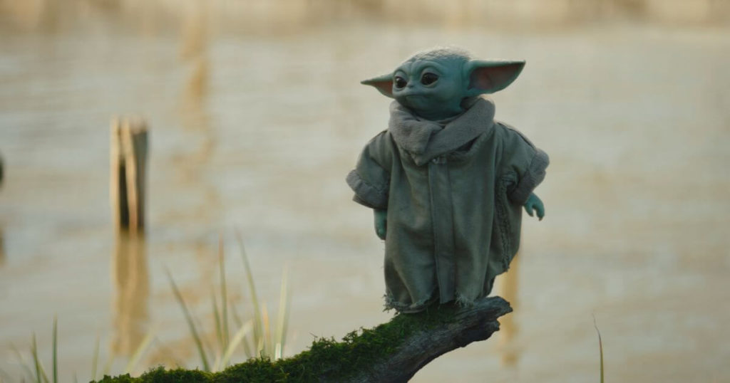 Photo still of a scene featuring Grogu as he is training with Luke Skywalker.