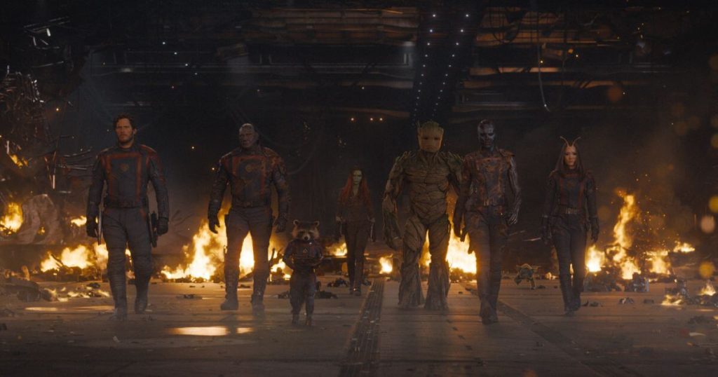 Photo still from Guardians of the Galaxy, Vol. 3, featuring Peter Quill, Drax, Rocket, Gamora, Groot, Nebula, and Mantis.