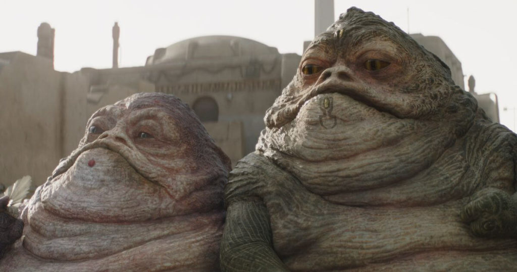 Photo still of a scene featuring the twins, cousins of Jabba the Hutt.