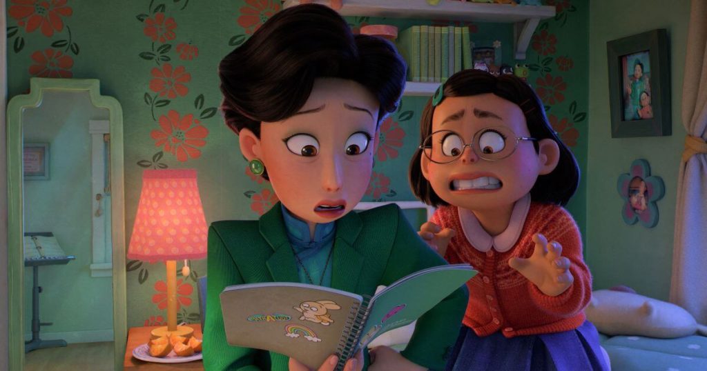 Photo still of Ming reading her daughter Meilin's journal while Meilin anxiously watches.