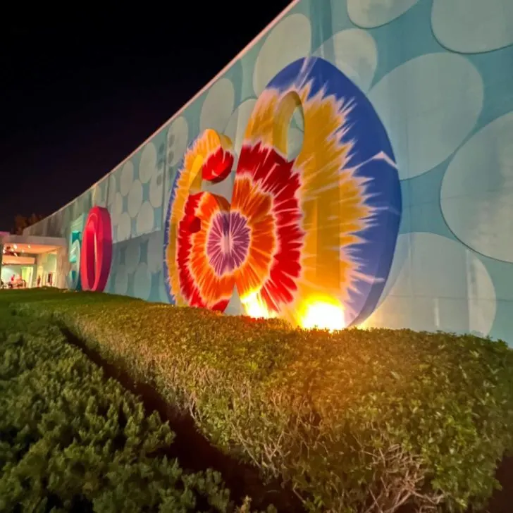 Photo of the decade number signs outside the Pop Century main hall building.