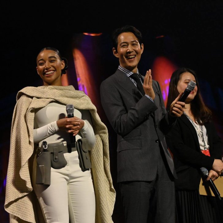 Photo of Amandla Stenberg and Lee Jung-jae onstage during The Acolyte panel at the Star Wars Celebration 2023 in London.