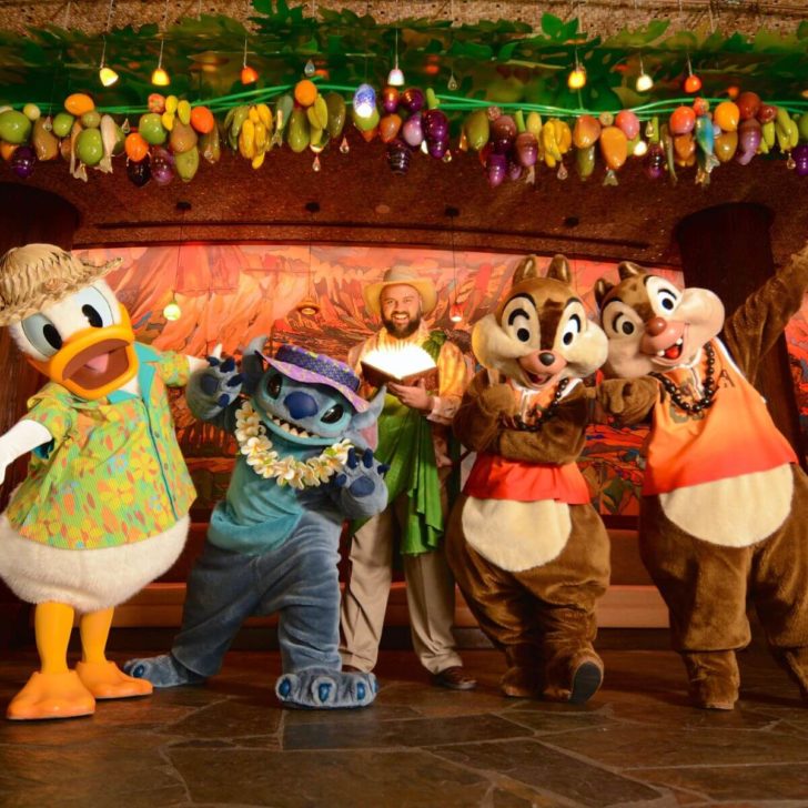 Photo of Donald Duck, Stitch, Chip and Dale, posting with a cast member at Makahiki Restaurant in Aulani.