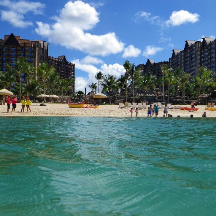Photo from the lagoon at Aulani, looking toward the beach, with the resort in the background.