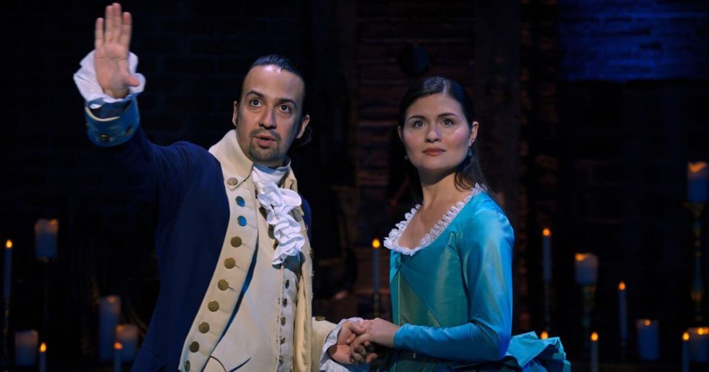 Photo of Lin-Manuel Miranda as Alexander Hamilton and Phillipa Soo as Eliza Hamilton in the filmed version of the original Broadway production.