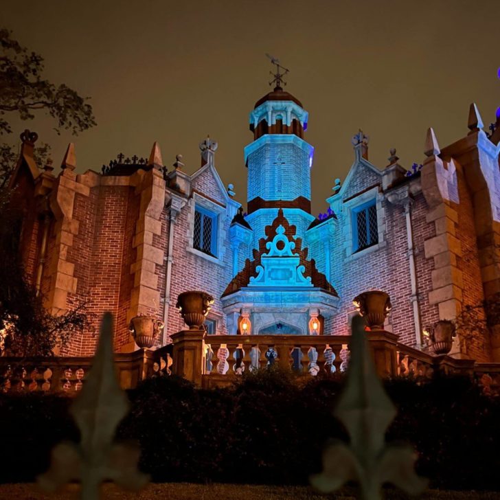 Photo of the Haunted Mansion at night in Disney World's Magic Kingdom.