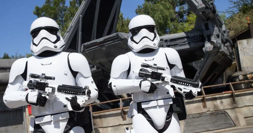 Photo of 2 stormtroopers posing menacingly with guns in Star Wars: Galaxy's Edge at Disneyland.