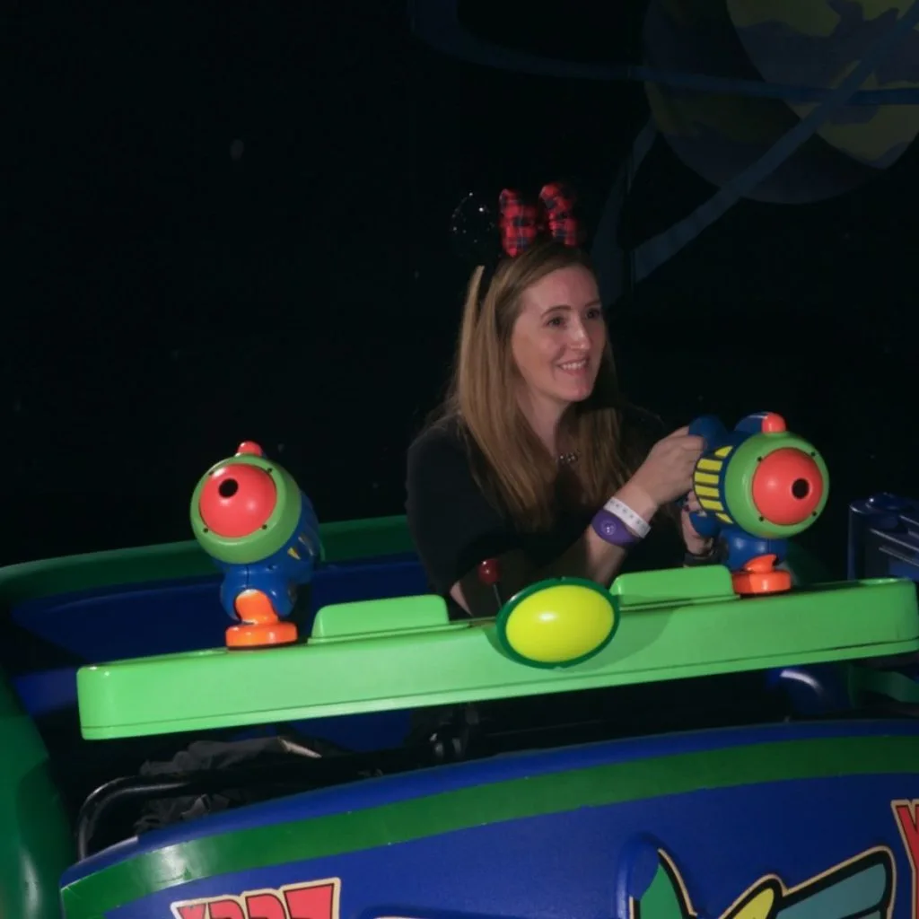 Photo of Meg Frost on Buzz Lightyear: Space Ranger Blast at Disney World's Magic Kingdom.