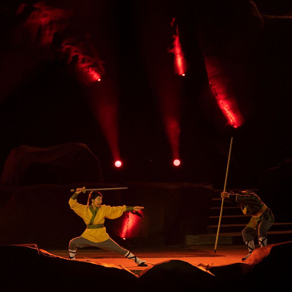 Photo of Mulan in a fight scene during Fantasmic!