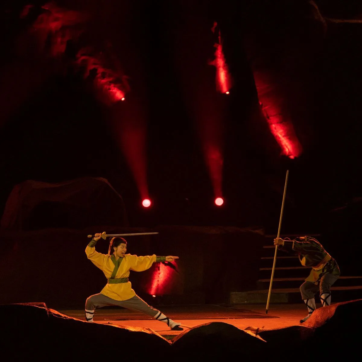 Photo of Mulan in a fight scene during Fantasmic!