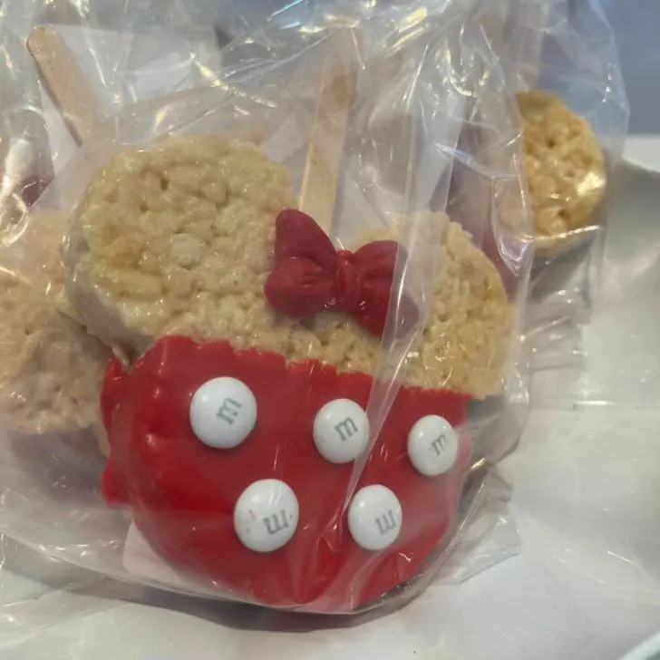 Photo of a Minnie Mouse themed crisped rice treat wrapped in plastic.